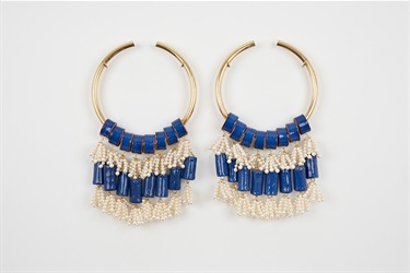 Monica Rani Rudhar, Blue and white short hoops, glazed terracotta, glass beads, brass, 54 x 75 x 8 cm. Appears courtesy of Ames Yavuz.