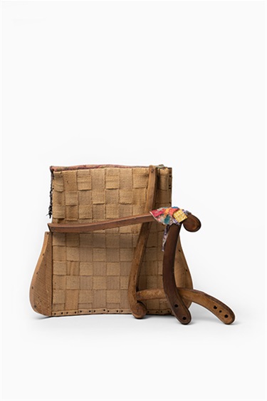 Fiona J Schoer, Retracted Form with Corsage, timber, fabric, jute, metal fixings, 57.5 x 77 x 30 cm.