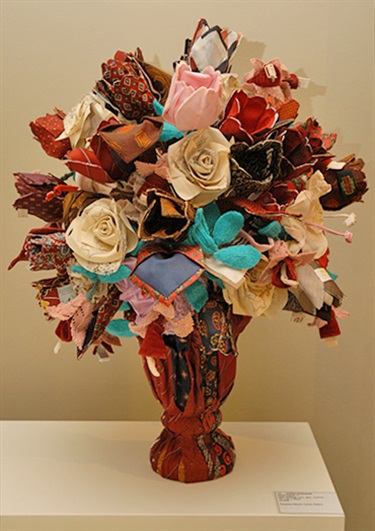 Karen Ferguson, Floral Tribute 3, used clothing, wire, glue, ceramic, 70 x 45 x 45 cm. Courtesy of Dianne Tanzer Gallery.