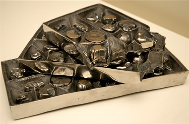 Kendal Murray, Affection Blinds Reason, cast stainless steel, 9 x 19 x 29 cm.