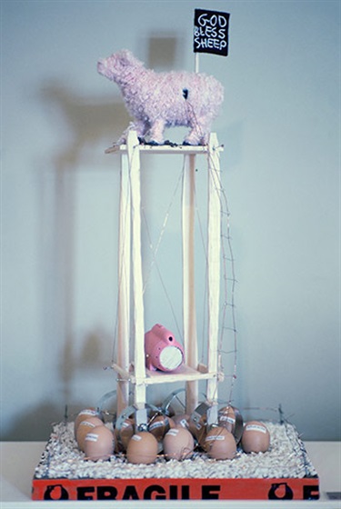 John Pitt, The leaders of the western world meet amid tight security, balsa wood, copper wire, child's toy, spray paint, wool, eggs, soil, 40 x 40 x 70 cm.