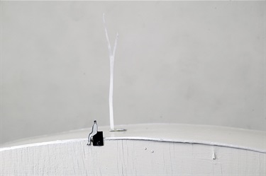 Noel McKenna, Seated Man, tin, wood, enamel, paint, 33 x 28 x 80 cm. Courtesy of Darren Knight Gallery.
