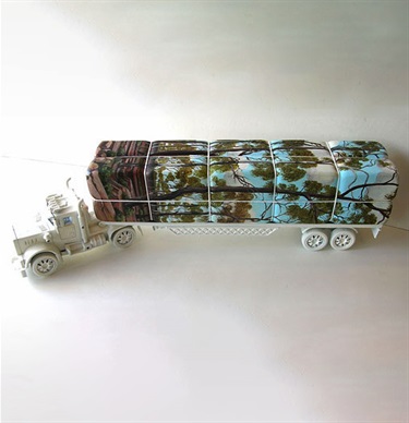 Dale Cox, Untitled (Logging Truck from Inland Series) 2007, plastic toy truck, wood, acrylic paint, string, 16 x 60 x 9 cm. Courtesy of Dianne Tanzer Gallery.