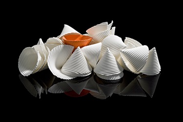 Titania Henderson, Piled Up, bone china, 25 x 51 x 38 cm. Courtesy of Karen Woodbury Gallery.