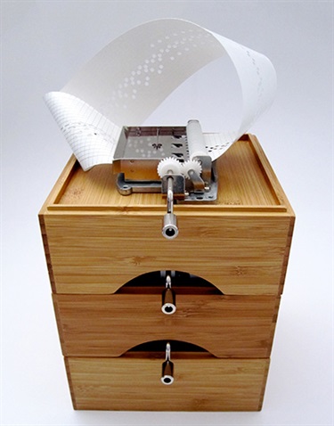 Adam Simmons, Tower of Babel, metal music box, bamboo, paper, 20 x 21 x 28 cm. Courtesy of Catherine Asquith Gallery.
