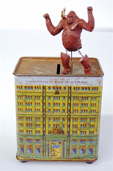 Di Holdsworth, The Banking Giant, vintage tin money box, plastic toys, music box, piano wire, 16 x 9 x 6 cm. Courtesy of Damien Minton Gallery.