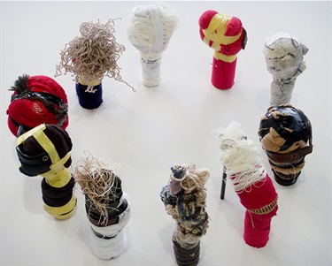 Gaye Jurisich, Oddbods, mixed media, waste, fabrics, tape, 17 x 5 cm each, 75 cm diameter.