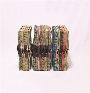 Liz Walker, Writers Block, recycled Reader's Digest condensed novel covers, 32 x 39 x 21 cm.