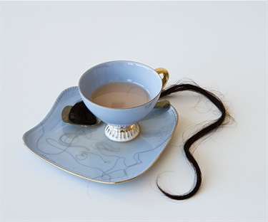 Sarah Field, Sickly Sweet, found objects, hair, resin, bone china, 15 x 15 x 15 cm. Courtesy of Michael Reid Gallery.