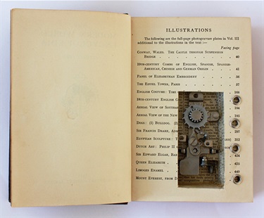 Elke Jacobsen, Embedded, mixed media, recycled typewriter, books, 13 x 10 x 12 cm.