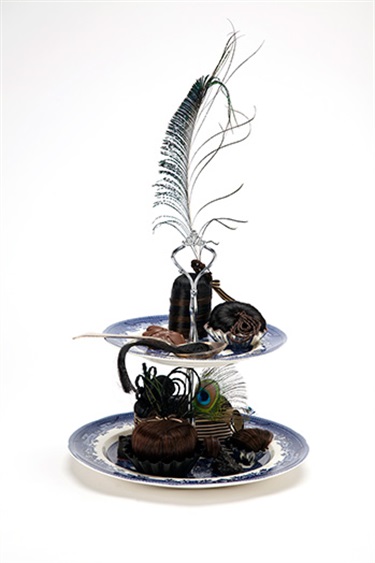 Sarah Field, Vision of Excess, hair, resin, feathers, fabric, china, cutlery, 60 x 30 x 30 cm. Courtesy of Michael Reid Gallery.
