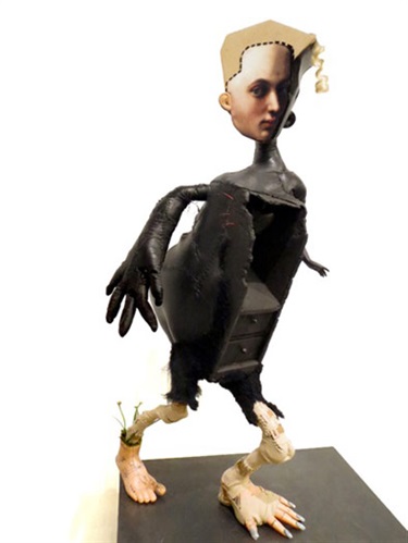 Aly Aitken, ...something borrowed, timber, sheep leather, shearling, modelling compound, ply, bandage, plastic body parts, digital image, found objects, 78.5 x 48.5 x 31 cm.