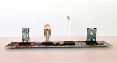 Colin Offord, North South East West, metal parts, detritus, 73 x 15 x 20 cm.