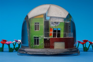 Naomi Ullmann, Dreams are made of this, snow domes, recycled credit cards, water, enamel paint, plastic, glitter, 9 x 7 cm (x 3). Courtesy of The Hughes Gallery.