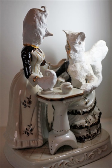 Lisa Anderson, Tricksters: The Tea Ceremony, fired porcelain, found object, mache clay, 25 x 19 x 13 cm.