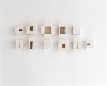 Samantha Mackie, See What I Saw? The Anatomy of a Cardboard Box, porcelain, 30 x 60 x 5 cm.